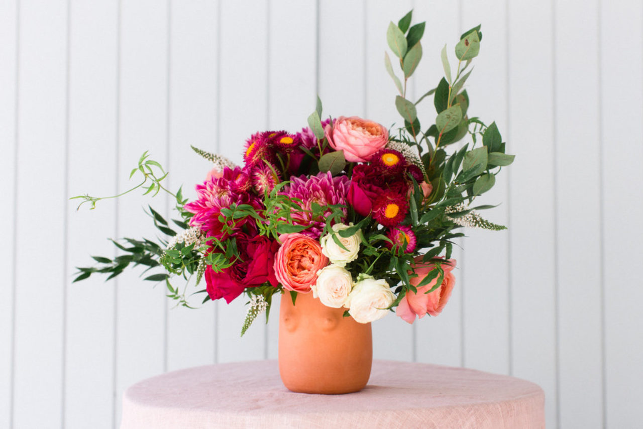 Fall Floral Workshop with a pot and beautifully arranged flowers at our boutique hotel in Des Moines